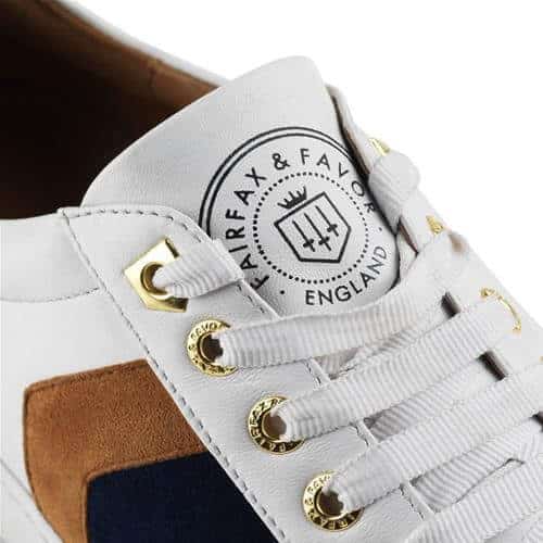The Alexandra Trainer in navy tan Out and About
